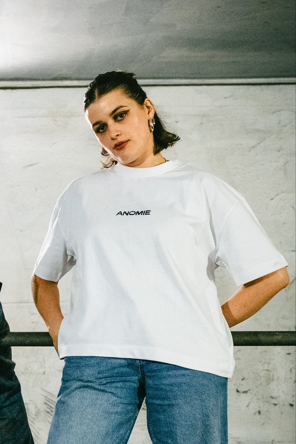 Model wearing the Normal Is A Lie Boxy Tee by ANOMIE.