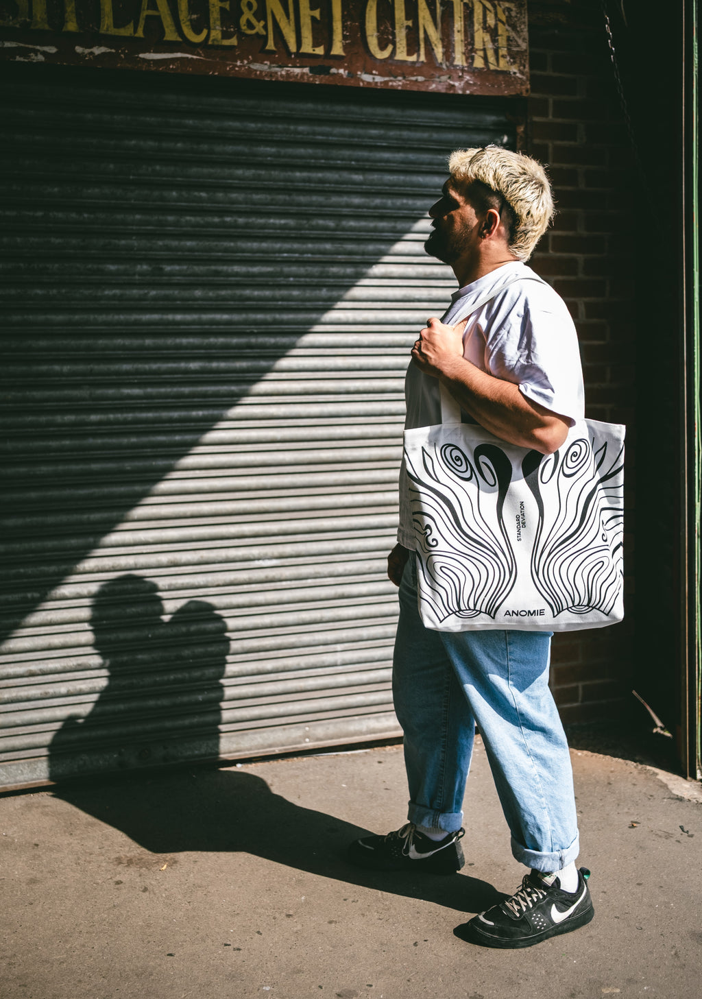 Model wearing VISION UTILITY BAG.