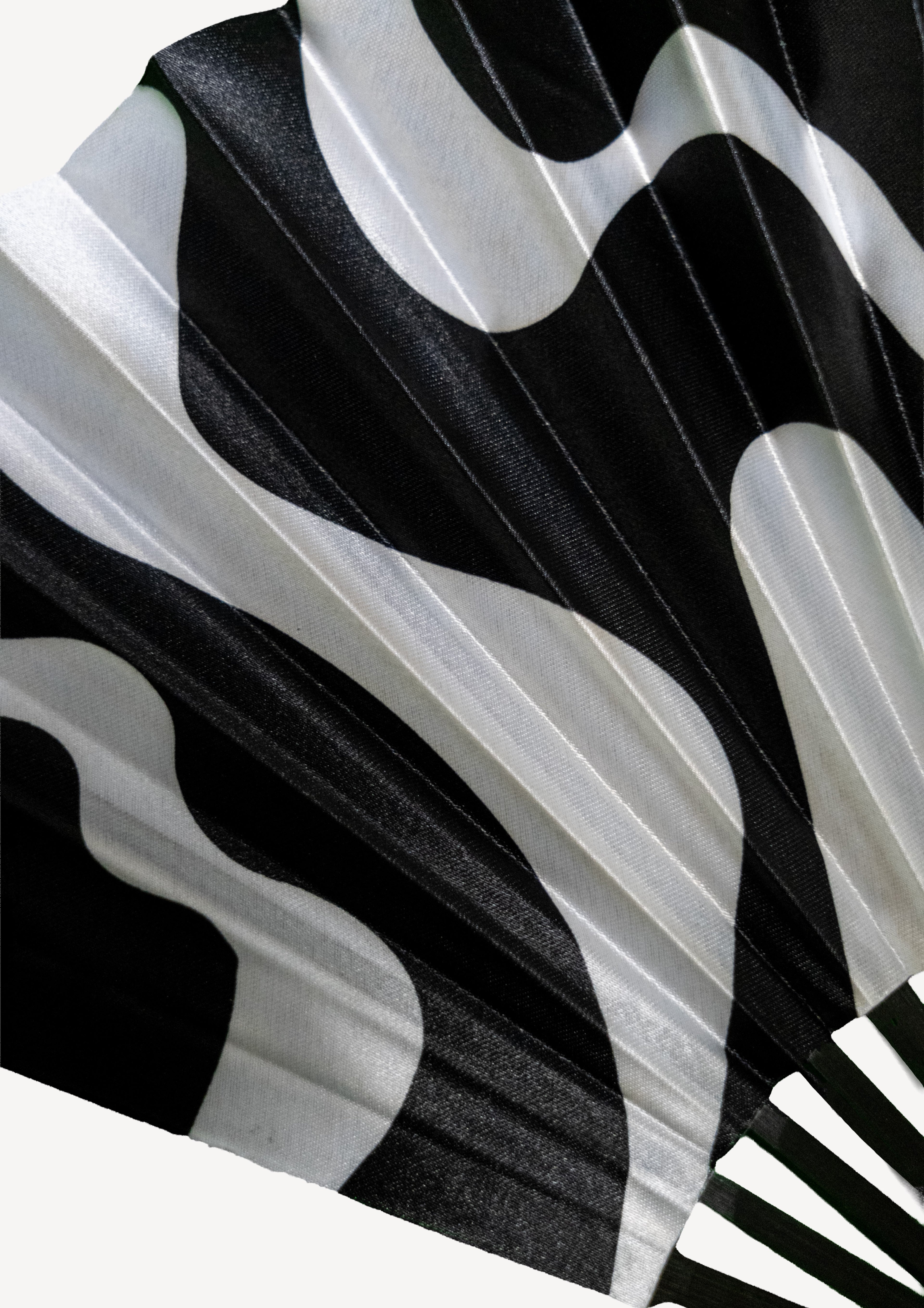 SWEATBOX HAND FAN, detail. 